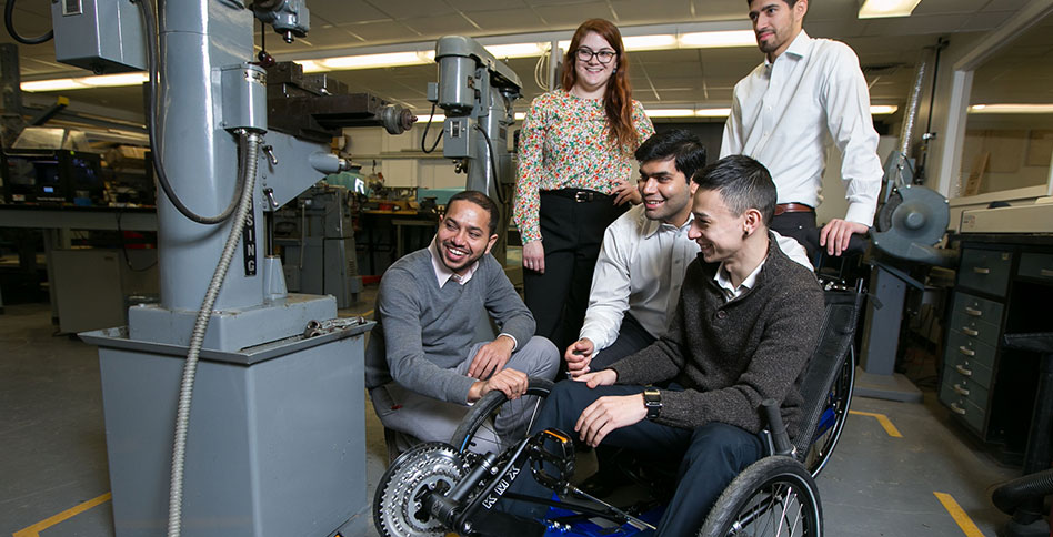 students working with automated wheelchair students working with automated wheelchair