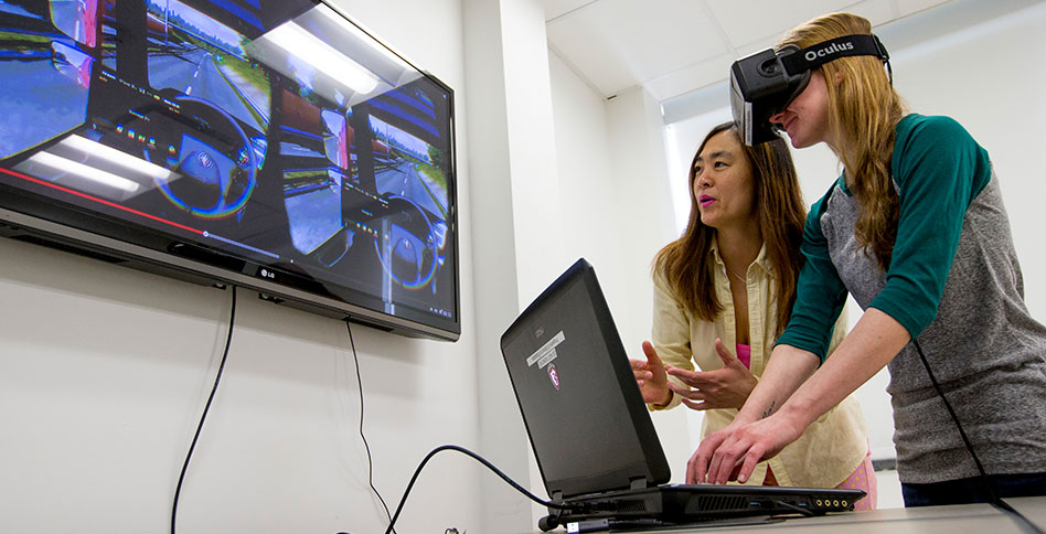 students using virtual reality goggles students using virtual reality goggles