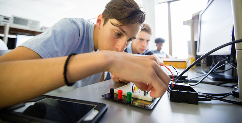 Student working on circuits Student working on circuits