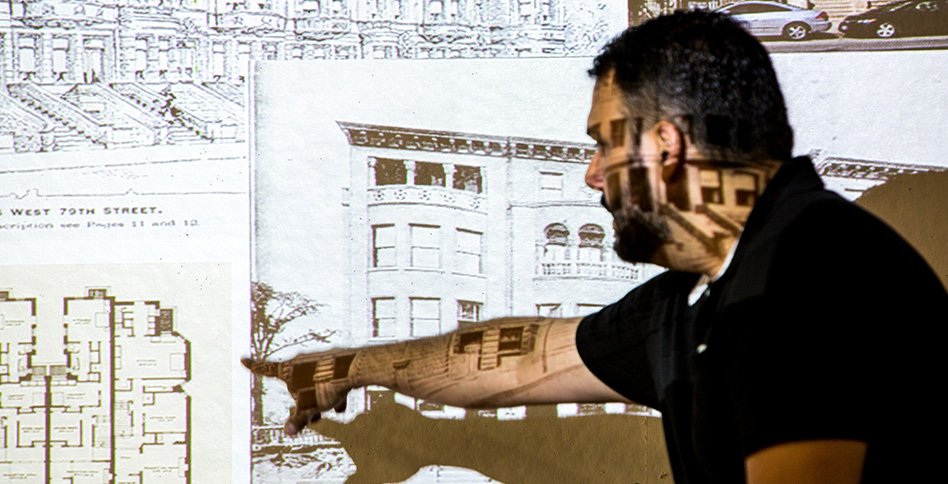Student pointing at overhead projection Student pointing at overhead projection