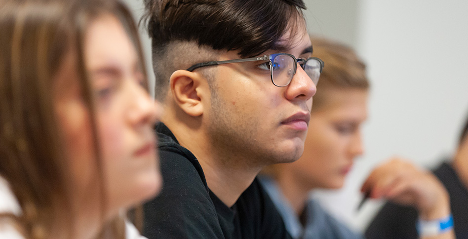 Closeup of students listening Closeup of students listening