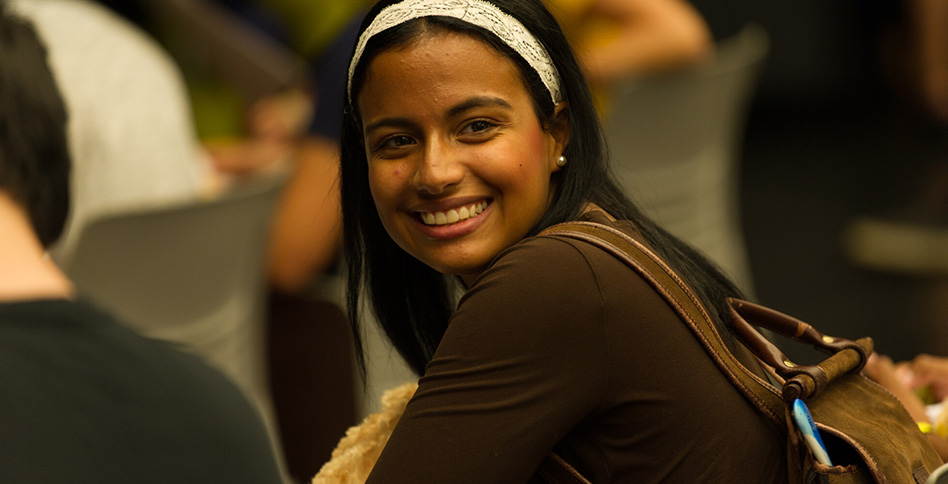Student with backpack smiling Student with backpack smiling