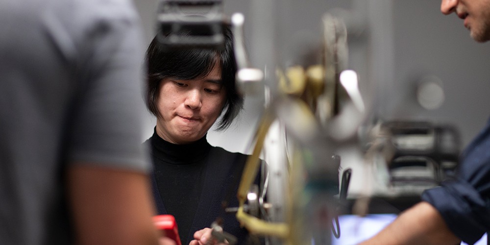 Students working on bicycle
