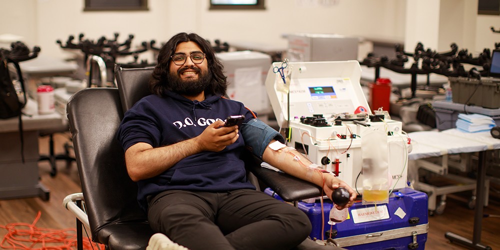 Student giving blood