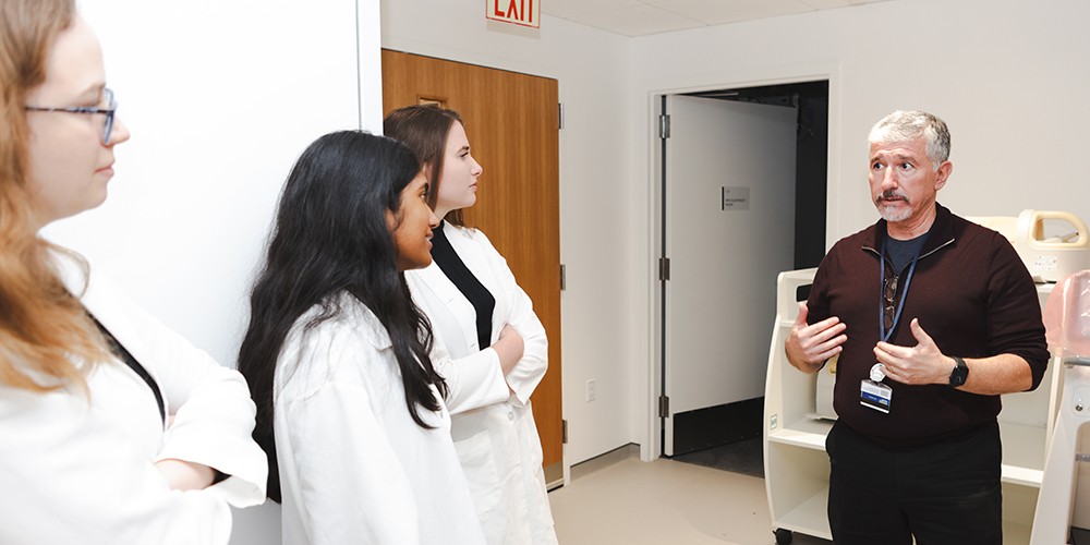 Students listening to faculty