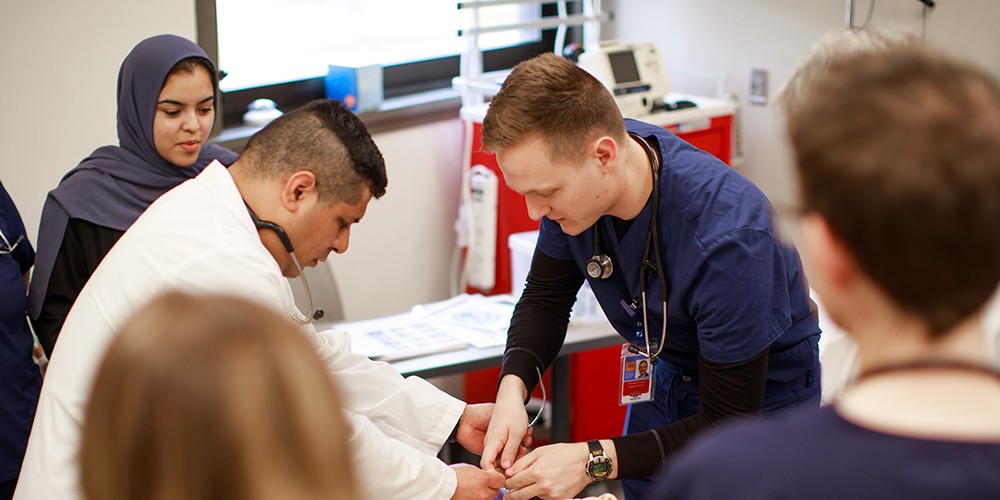 Students drawing blood