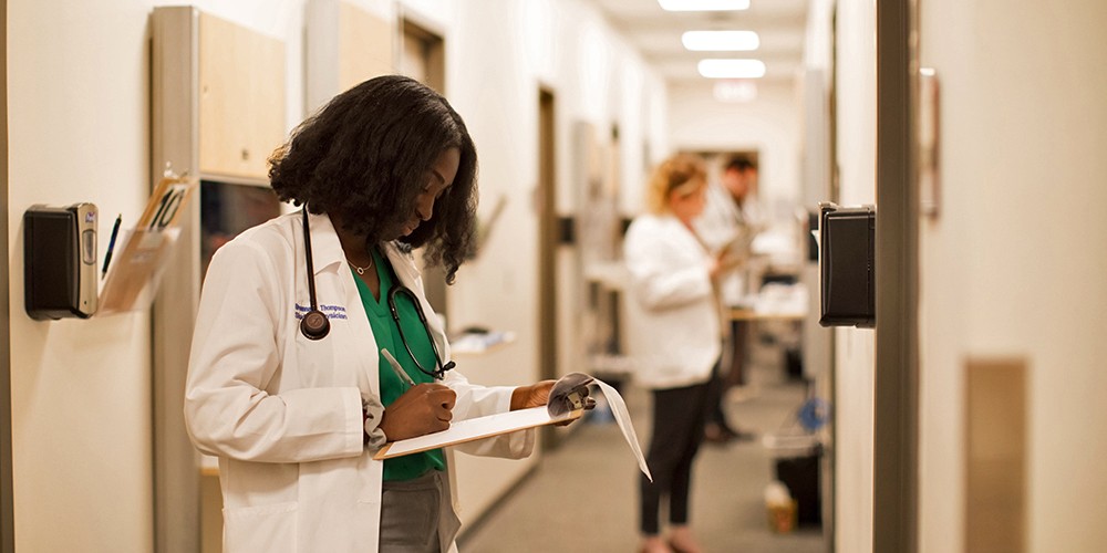 Doctors working on charts