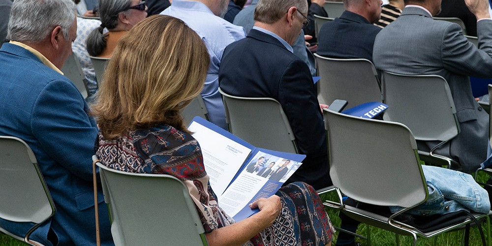 Woman reading facts sheet