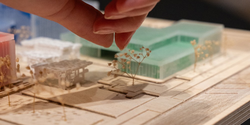 Fingers touching model street